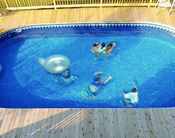 Pool with Wooden Deck in St. Louis